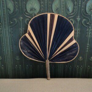 vintage wicker fan wall decor